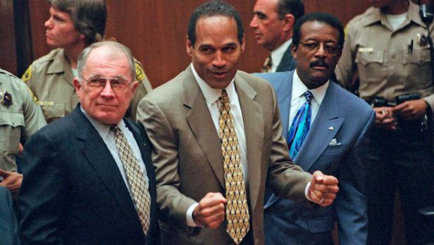FILE - In this Oct. 3, 1995 file photo, O.J. Simpson, center, reacts as he is found not guilty of murdering his ex-wife Nicole Brown and her friend Ron Goldman, as members of his defense team, F. Lee Bailey, left, and Johnnie Cochran Jr., right, look on, in court in Los Angeles. Detectives are investigating a knife purportedly found some time ago at the former home of O.J. Simpson, who was acquitted of murder charges in the 1994 stabbings of his ex-wife Nicole Brown Simpson and her friend Ron Goldman, Neiman said Friday. (Myung J. Chun/Daily News via AP, Pool)