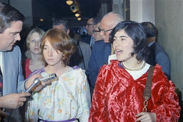 Lynette “Squeaky” Fromme (left), and Catherine “Gypsy” Share, speaking outside the courtroom in the Los Angeles Hall of Justice after the hearing, January 27, 1970 [AP Photo/David F. Smith]