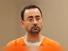 In this Nov. 22, 2017, file photo, Dr. Larry Nassar, appears in court for a plea hearing in Lansing, Mich.The $490 million settlement announced Wednesday, Jan. 19, 2022 by the University of Michigan is just $10 million shy of the $500 million Michigan State University agreed in 2018 to pay to sexual assault victims of its own sport doctor, Larry Nassar. 