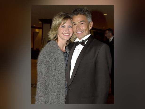 Actress Olivia Newton-John poses with her boyfriend Patrick McDermott at the 10th Annual Human Rights Campaign Gala, February 17, 2001 in Los Angeles, CA. (