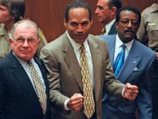 FILE - In this Oct. 3, 1995 file photo, O.J. Simpson, center, reacts as he is found not guilty of murdering his ex-wife Nicole Brown and her friend Ron Goldman, as members of his defense team, F. Lee Bailey, left, and Johnnie Cochran Jr., right, look on, in court in Los Angeles. Detectives are investigating a knife purportedly found some time ago at the former home of O.J. Simpson, who was acquitted of murder charges in the 1994 stabbings of his ex-wife Nicole Brown Simpson and her friend Ron Goldman, Neiman said Friday. (Myung J. Chun/Daily News via AP, Pool)