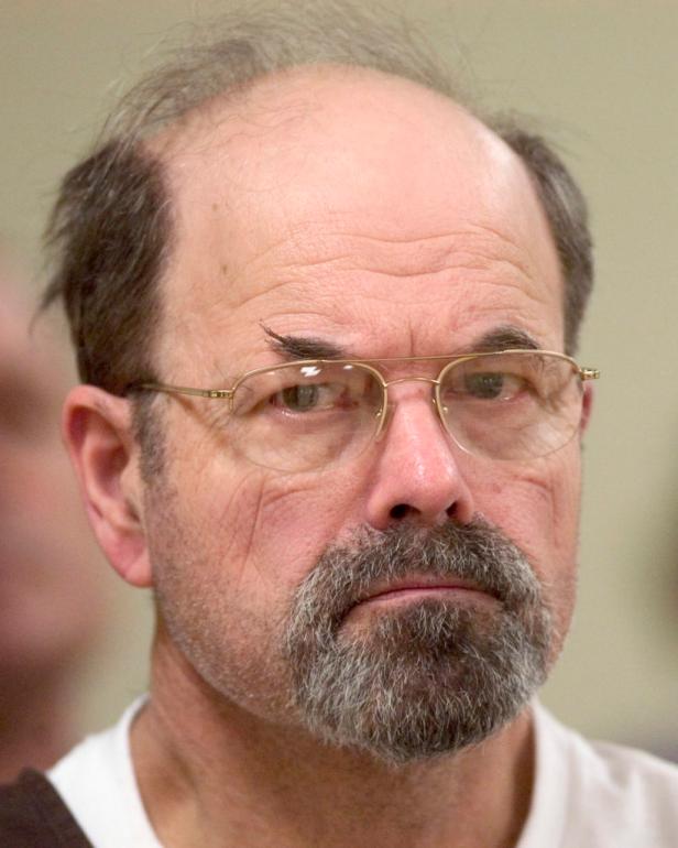 FILE - In this Oct. 12, 2005, file photo, convicted BTK killer Dennis Rader listens during a court proceeding in El Dorado, Kan. A 
new book says the BTK serial killer planned to kill an 11th victim by hanging her upside down in her Wichita, Kansas, home. Itâ  s a story police heard from Dennis Rader himself in 2005, but decided at the time to suppress to protect the woman. The story was made public in â  Confession of a Serial Killer: The Untold Story of Dennis Rader, the BTK Killer,â   which has a scheduled release date of Sept. 6. (Travis Heying/The Wichita Eagle via AP, Pool)