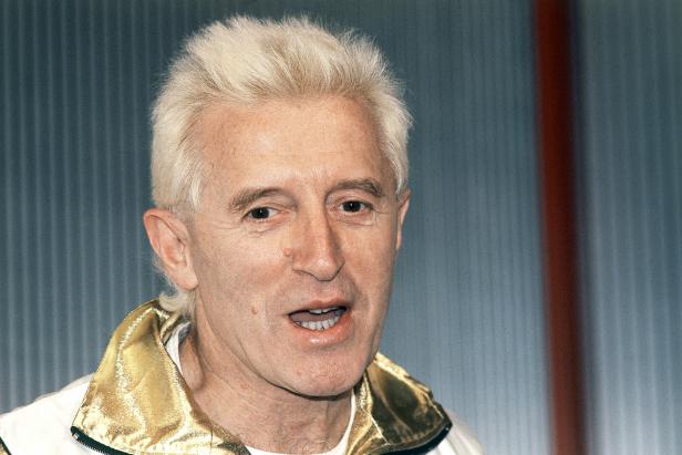 FILE - This is a   Dec. 17, 1986 file photo of British disc jockey and BBC  TV presenter  Jimmy Savile  at Madame Tussauds museum in London. The BBC is struggling to contain a crisis sparked by allegations of serial sexual abuse against the late Jimmy Savile, a longtime children's television host.  Dozens of women have come forward to say that Savile, who died in October 2011 aged 84, sexually assaulted them when they were as young as 13. London's Metropolitan Police, which is leading a national investigation, says it has identified 40 potential victims.  (AP Photo/John Redman)