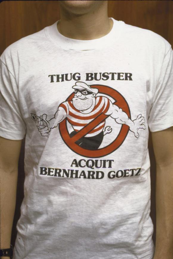 NEW YORK, UNITED STATES - JANUARY 01:  Individual wearing a "Thug Buster" T-shirt in support of Bernhard Goetz, the subway vigilante.  (Photo by Hugh Patrick Brown/The LIFE Images Collection/Getty Images)