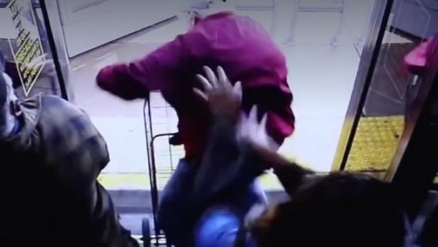Man being pushed from bus [WFLA/screenshot]