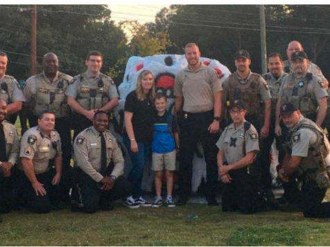 Georgia Sheriff's Deputies Escort Slain Colleague’s Son To School