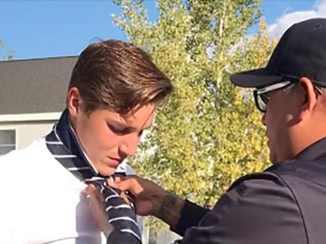 Cop Pulls Over Mom For Running Stop Sign; Teaches Her Teen Son How To Tie His Tie