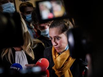 Valérie Bacot talks to journalists as she leaves Chalon-sur-Saone Courthouse on June 25, 2021 at the end of her trial. [via Getty Images/Jeff Pachoud/AFP]