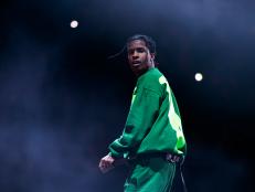 US rapper ASAP Rocky performs during a concert on December 11, 2019 in Stockholm. He's wearing a green sweatsuit.