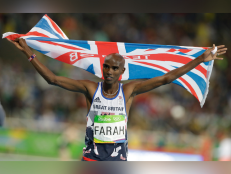 Britain's Mo Farah celebrates winning the gold medal in the men's 10,000-meter final during the athletics competitions of the 2016 Summer Olympics at the Olympic stadium in Rio de Janeiro, Brazil, Saturday, Aug. 13, 2016.