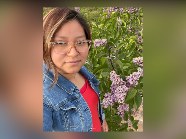 Faith Robles, pictured here next to flowers, helped put her captors behind bars. 