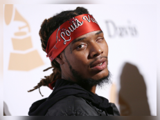 In this Feb. 14, 2016, file photo, Fetty Wap arrives at the 2016 Clive Davis Pre-Grammy Gala at the Beverly Hilton Hotel in Beverly Hills, California.