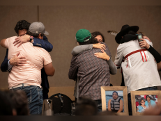 Family of the victims of a series of stabbings on the James Smith Cree Nation reserve in the Canadian province of Saskatchewan hug following a news conference in Saskatoon, Saskatchewan on Wednesday, Sept. 7, 2022. 