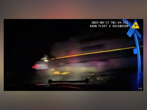 Body-Cam Video Shows Train Hitting Police Car With Woman Handcuffed Inside