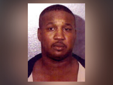 This undated file photo provided by the Baton Rouge Police Department shows Derrick Todd Lee. Lee, who was convicted of murdering two women and was sentenced to death for the second killing, has died at a hospital. 