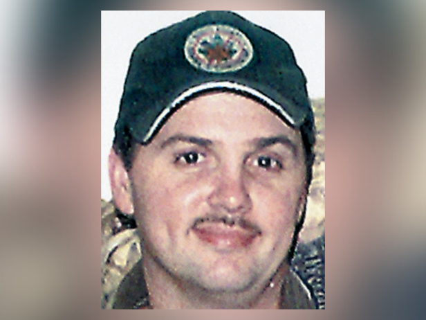 35-year-old Hubert Dean “John John” Yancey, pictured here smiling, was shot and killed on Nov. 28, 2003. 