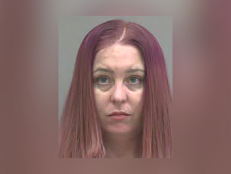 Kristi Nicole Gilley, pictured here with pink hair, was arrested on a warrant for kidnapping out of Clay County, Missouri.
