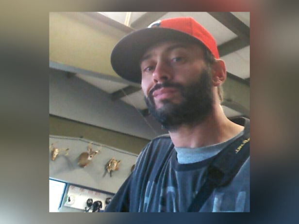 Jance Wesly Varela, pictured here, is 6’4 tall, 140 pounds, with gray/brown hair and brown eyes. He may have facial hair and has a tattoo of the pi symbol on his left hand. 