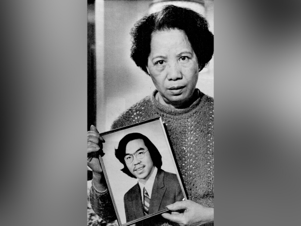 In this Nov. 2, 1983, photo, Lily Chin holds a photograph of her son Vincent, 27, who was beaten to death on June 23, 1982. 
