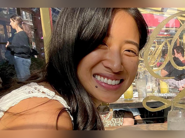 Christina Yuna Lee, pictured here smiling, was stabbed to death in her apartment after a man followed her into her building.