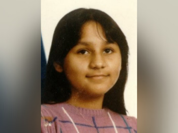 Angelica Maria Gandara, pictured here at 11 years old, is a Hispanic female with black hair and brown eyes. 