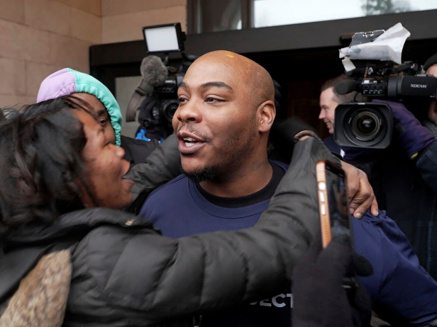 Marvin Haynes, 35, pictured here, is hugged by a supporter as he walks out of the Minnesota Correctional Facility at Stillwater in Bayport, Minn. on Monday, Dec. 11, 2023.