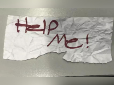 Kidnapping Victim Helps Orchestrate Her Own Rescue By Holding Up Sign Saying 'Help Me'